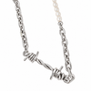 A silver-toned chain necklace featuring a twisted barbed wire pendant and a section of white pearl beads, shown against a plain white background.