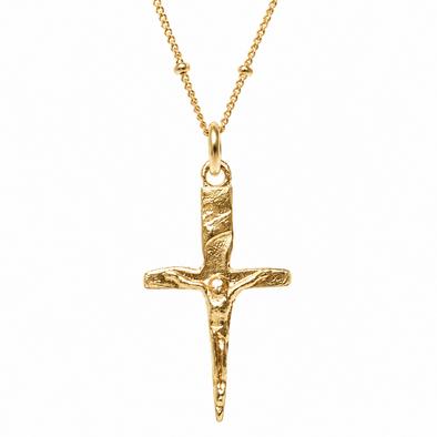 A textured gold crucifix pendant necklace on a delicate gold chain, shown against a plain white background.