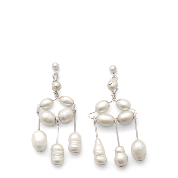 Pair of pearl earrings on a white background