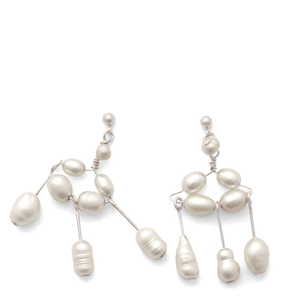 Pearl earrings on a white background