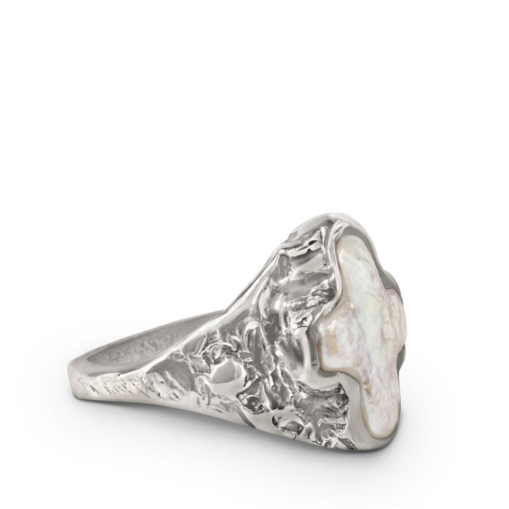silver signet with a cross shaped pearl in bezel setting