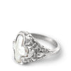 silver signet with a cross shaped pearl in bezel setting