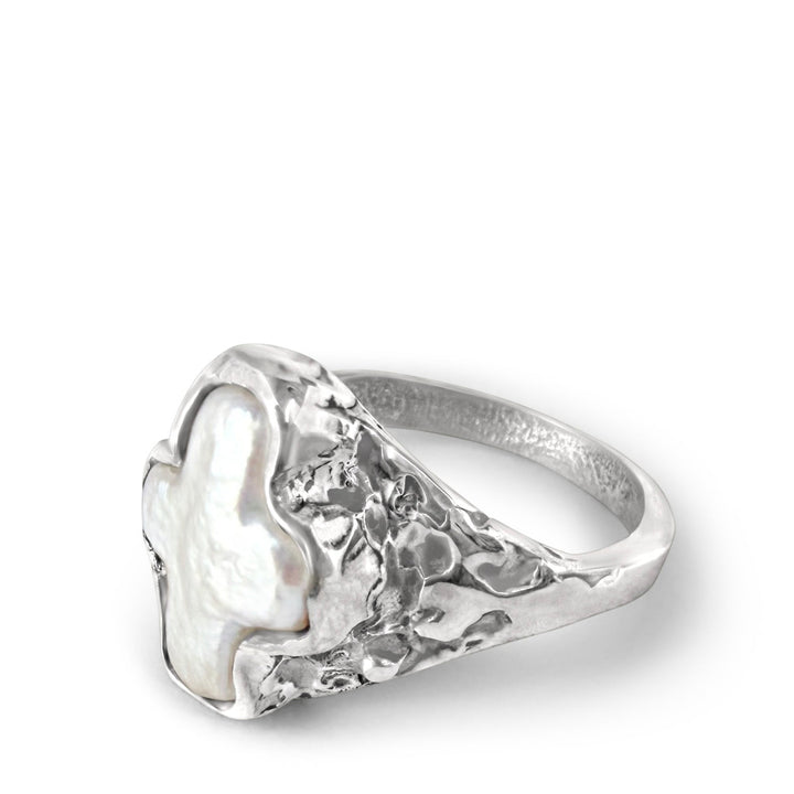 silver signet with a cross shaped pearl in bezel setting