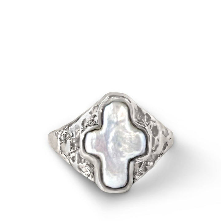 silver signet with a cross shaped pearl in bezel setting