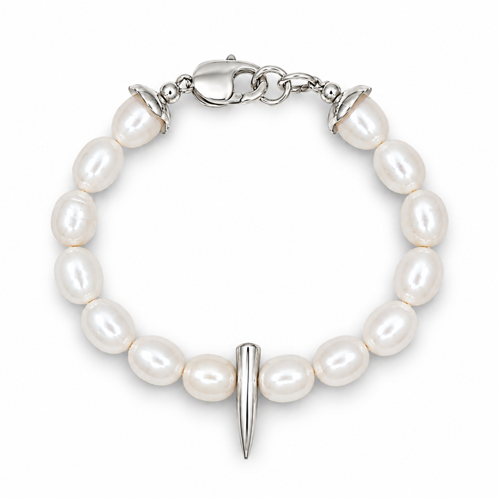 A pearl beaded bracelet with a silver spike charm and lobster clasp, shown on a clean white background.