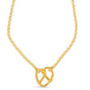 Gold necklace with a Pretzel shaped  pendant pendant on a white 