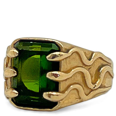 green tourmaline gemstone entrapped by a fleet of snakes signet in solid gold