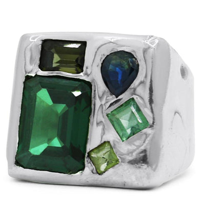 melty surface square signet ring cast in sterling silver with asymmetrically placed gemstones, which include: an XL Green Tourmaline gemstone, and 3 smaller Green Tourmaline gems in assorted sizes and shades, and 1 tear drop shaped blue Sapphire.