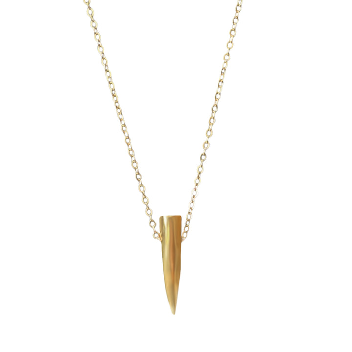 Gold necklace with a spike pendant on a white background