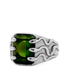 Silver ring with a green gemstone on a white background