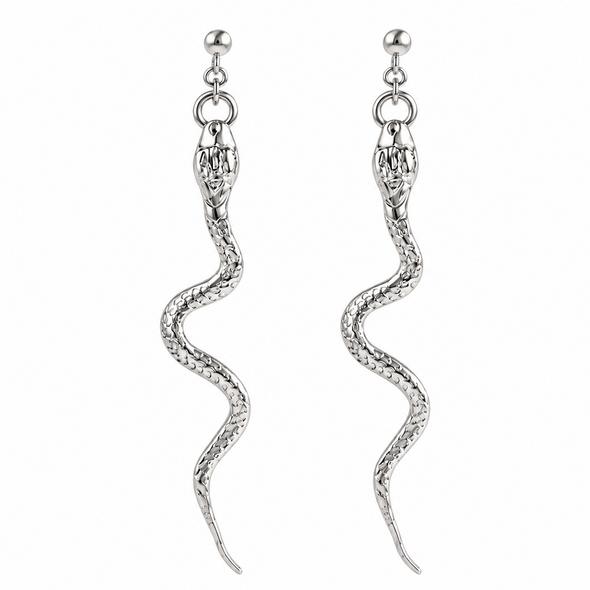 A pair of silver snake drop earrings with detailed scales and a textured body, hanging from small silver ball studs on a plain white background.