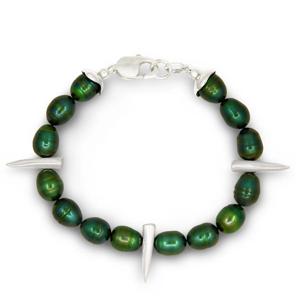 Green beaded bracelet with silver accents on a white background
