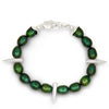 Green beaded bracelet with silver accents on a white background