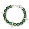 Green pearl bracelet with silver accents on a white background