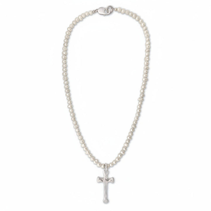Pearl necklace with a cross pendant on a white background