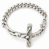A silver-toned metal bracelet featuring a detailed crucifix pendant with a textured cross and figure, set against a plain white background.