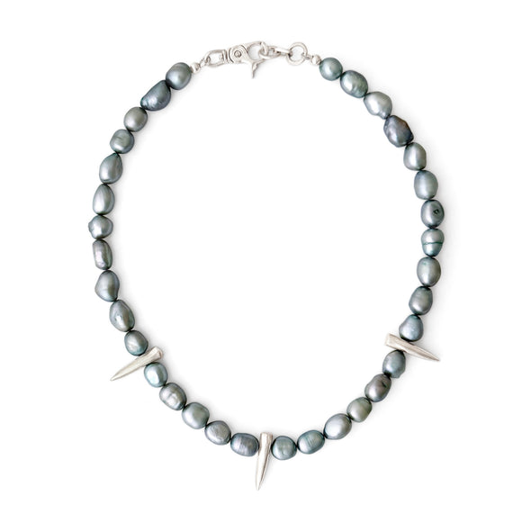 Necklace with gray beads and silver accents on a white background