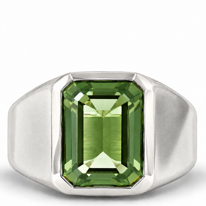 A silver signet ring featuring a large, rectangular emerald-cut green gemstone, shown against a plain white background.