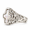 A silver signet-style ring featuring a textured, organic-shaped silver band and a central cross-shaped inlay of iridescent mother-of-pearl, shown on a plain white background.