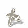 Silver cross-shaped ring on a white background