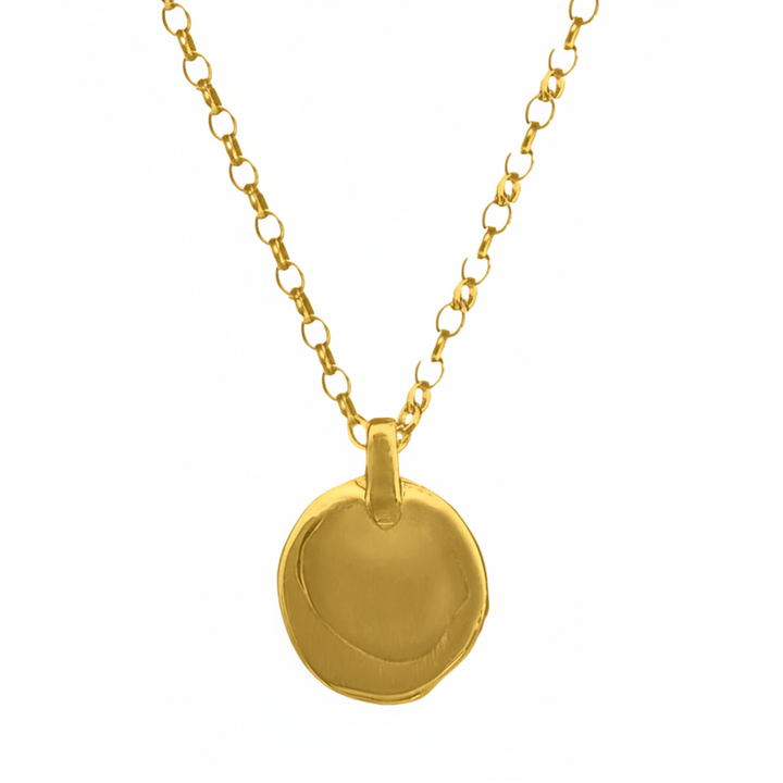 Gold necklace with a round pendant on a white background