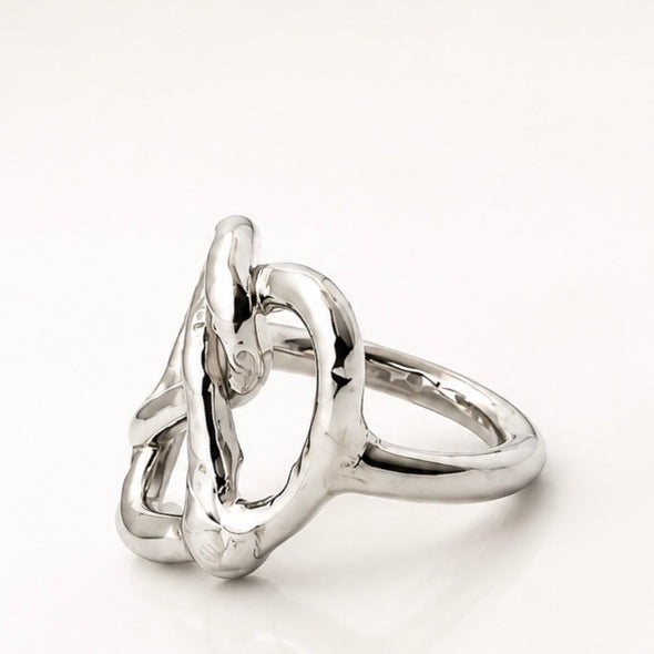 Silver Pretzel  ring with a unique design on a white background