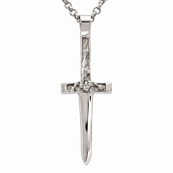 A polished silver sword pendant necklace featuring a detailed hilt with a sculpted figure, suspended from a matching silver link chain against a plain white background.