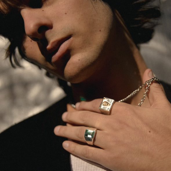 male model wearing our slick gemstone signet 