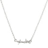 horizontal barbed wire sterling silver pendant hanging from silver rolo chain