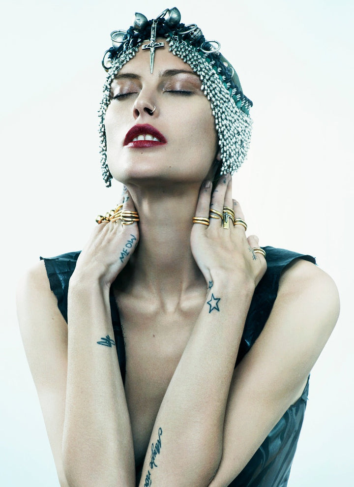 female model wearing our crucifix dagger headdress