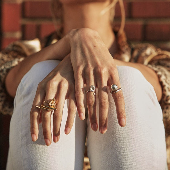 female model wearing our orb ring in silver