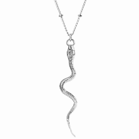 sterling silver snake shaped pendant hanging from silver beaded chain