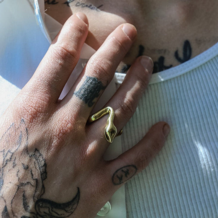 male model wearing our gold open snake ring