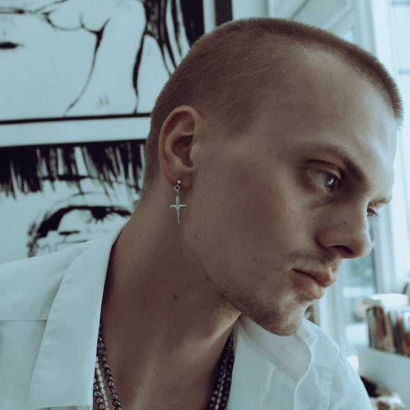 male model wearing our cross stud earring
