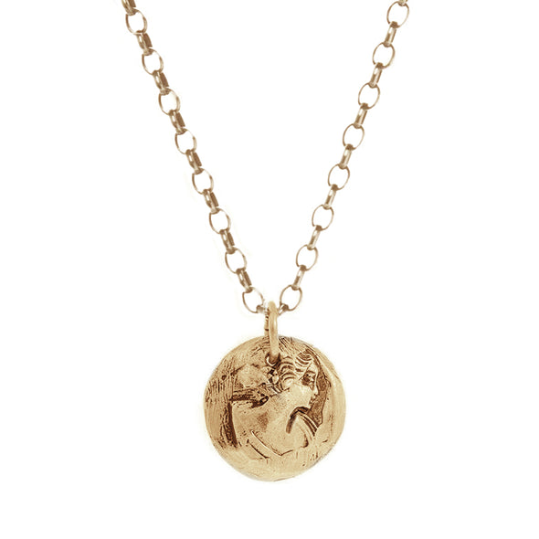 Coin necklace displaying a hand carved Maiden in 14k Gold plated-Brass. hanging from 14k gold filled rolo chain