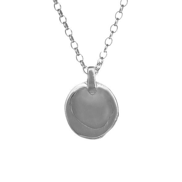 organic shaped coin made from sterling silver with silver rolo chain