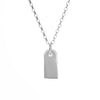 silver gravestone pendant hanging from silver rolo chain