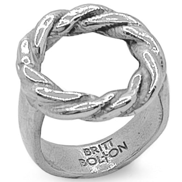 silver ring with a twisted hoop, shot on white background