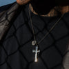 male model wearing our cross and coin necklace