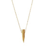 gold chain with gold spike pendant hanging from it