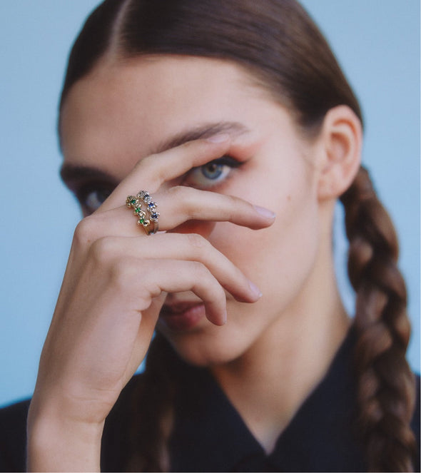 model wearing our 14K Studded Green Garnet Ring