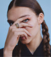 model wearing our 14K Studded Green Garnet Ring