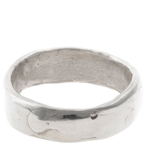 Handmade simple Sterling Silver band ring with a melted like texture.