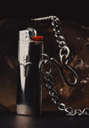 Standard bic Lighter sleeve made from nickel silver sheet, with Britt's handmade sterling Silver Crucifix Dagger pendant soldered onto it