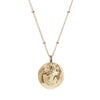 Coin necklace displaying a hand carved Maiden in 14k Gold plated-Brass. hanging from 14k gold filled hypoallergenic chain