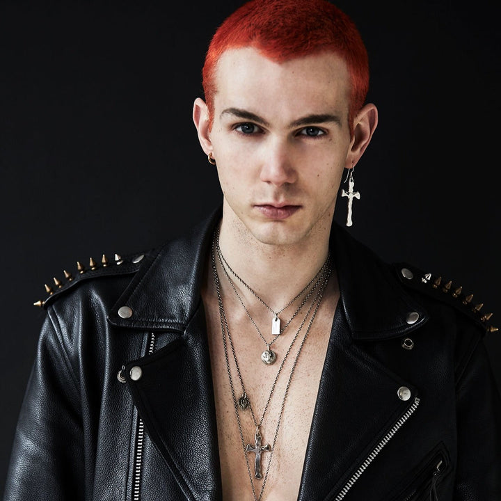 male model wearing our cross and coin necklace