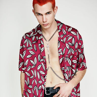 red haired male model wearing our iconic brass OR Silver Crucifix Harness. goes on over the head like a tank top and has one clasp behind neck.